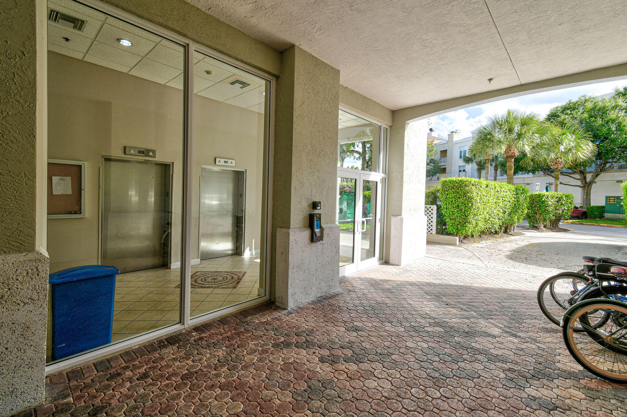 1200 Town Center Drive, Unit 326 Jupiter, FL 33458 - Photo 33 of 44 a view of a porch with a yard