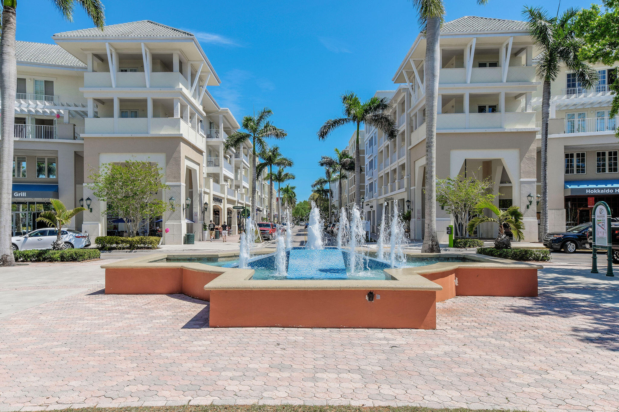 1200 Town Center Drive, Unit 326 Jupiter, FL 33458 - Photo 34 of 44 a front view of multiple houses with yard