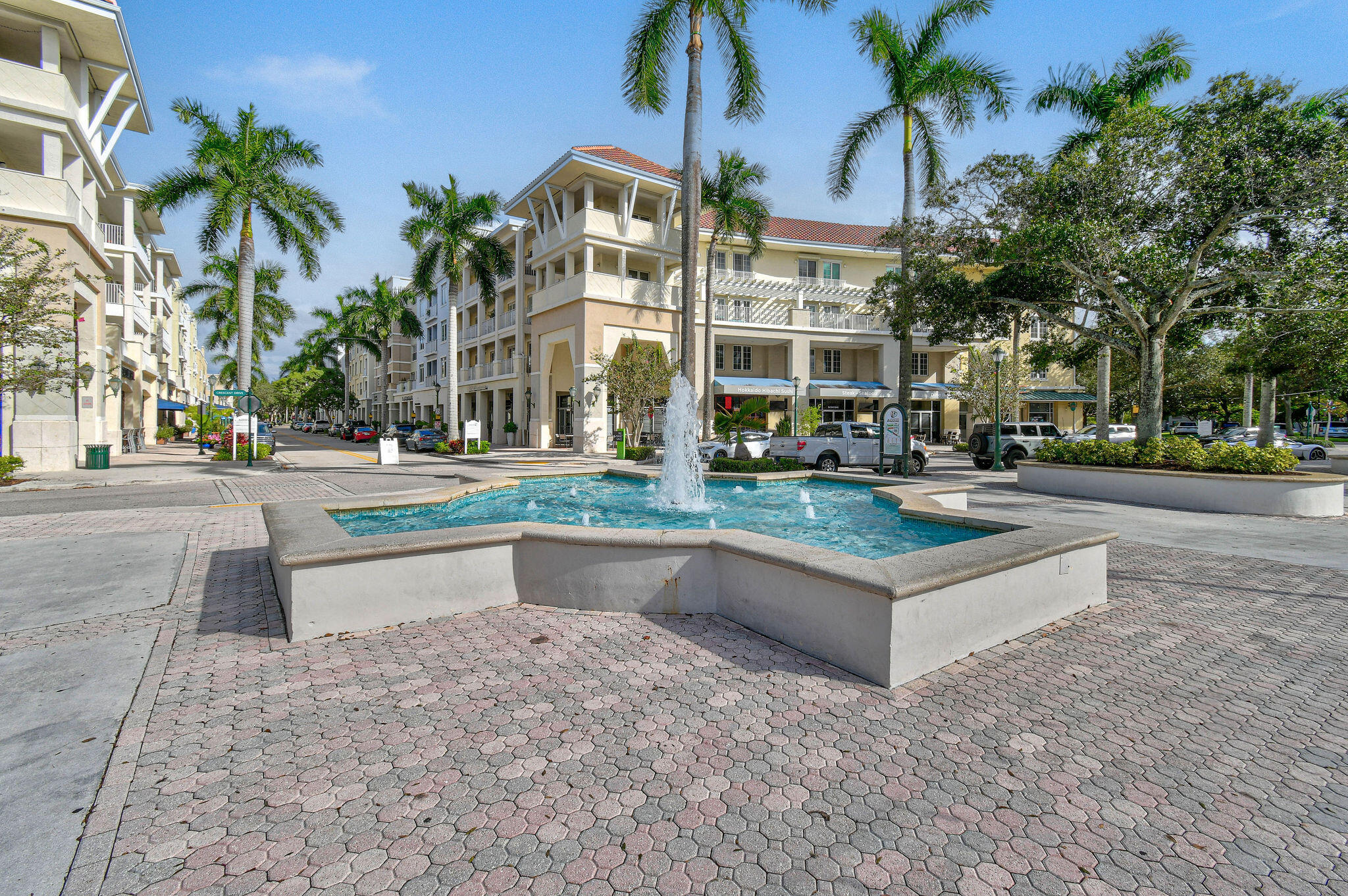 1200 Town Center Drive, Unit 326 Jupiter, FL 33458 - Photo 39 of 44 a building exterior with palm trees