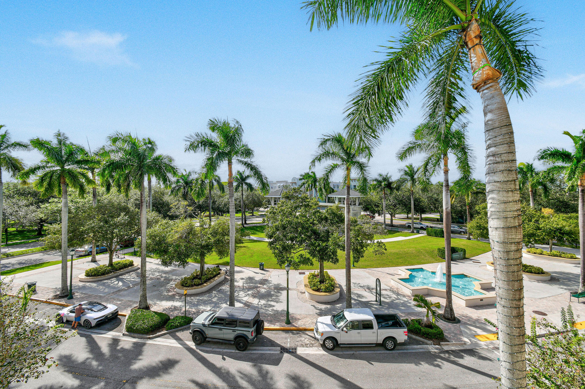 1200 Town Center Drive, Unit 326 Jupiter, FL 33458 - Photo 40 of 44 a view of swimming pool with a patio and outdoor seating