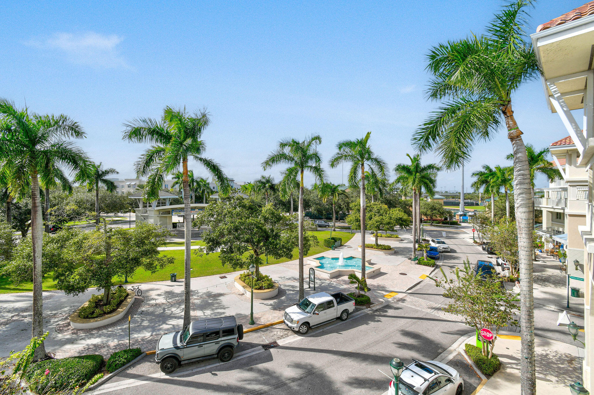 1200 Town Center Drive, Unit 326 Jupiter, FL 33458 - Photo 41 of 44 a view of a parking space with garden from a patio