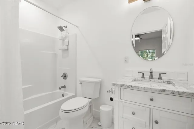 a bedroom with a bed and a cabinets