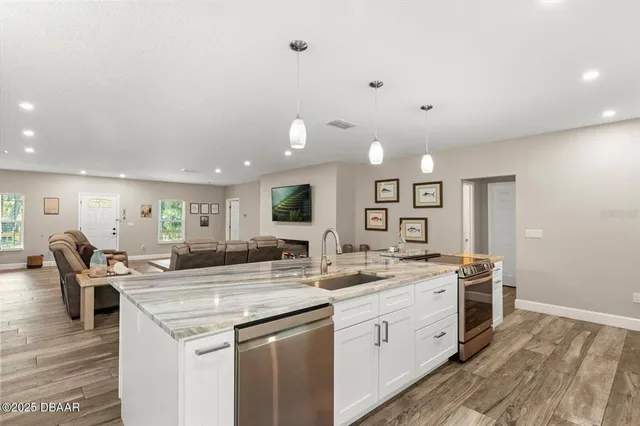 a kitchen with a sink and counter top space
