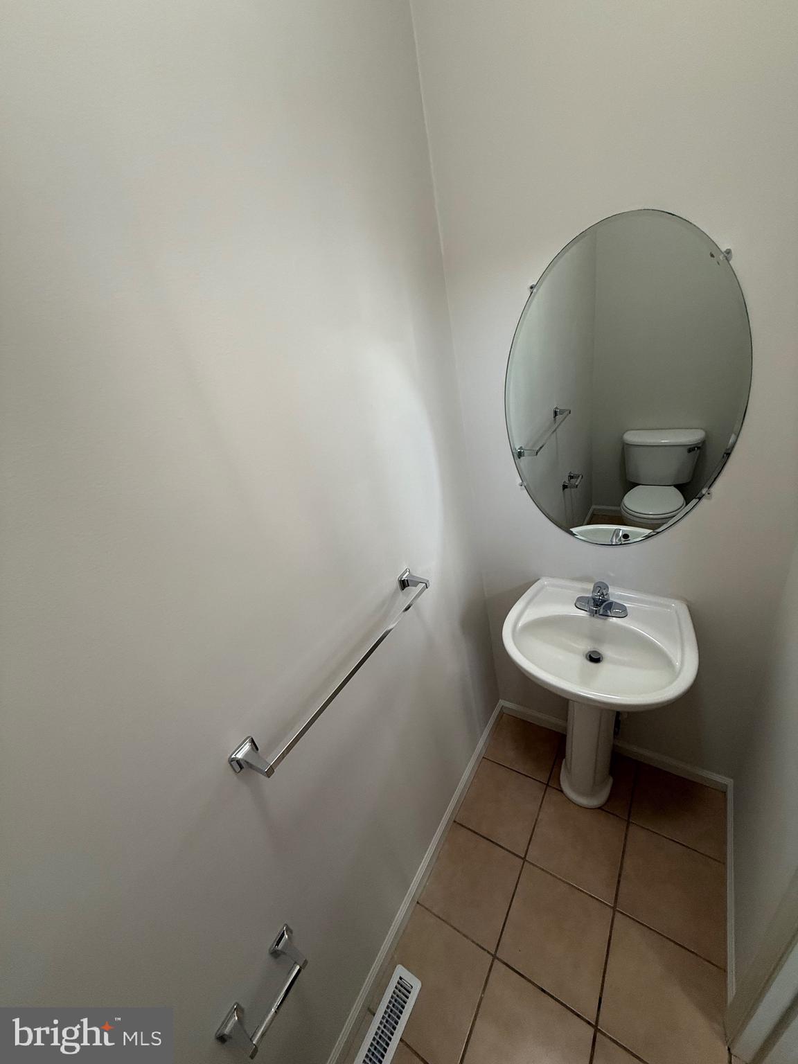 294 Mike Drive Elkton, MD 21921 - Photo 22 of 61 a bathroom with a sink and mirror