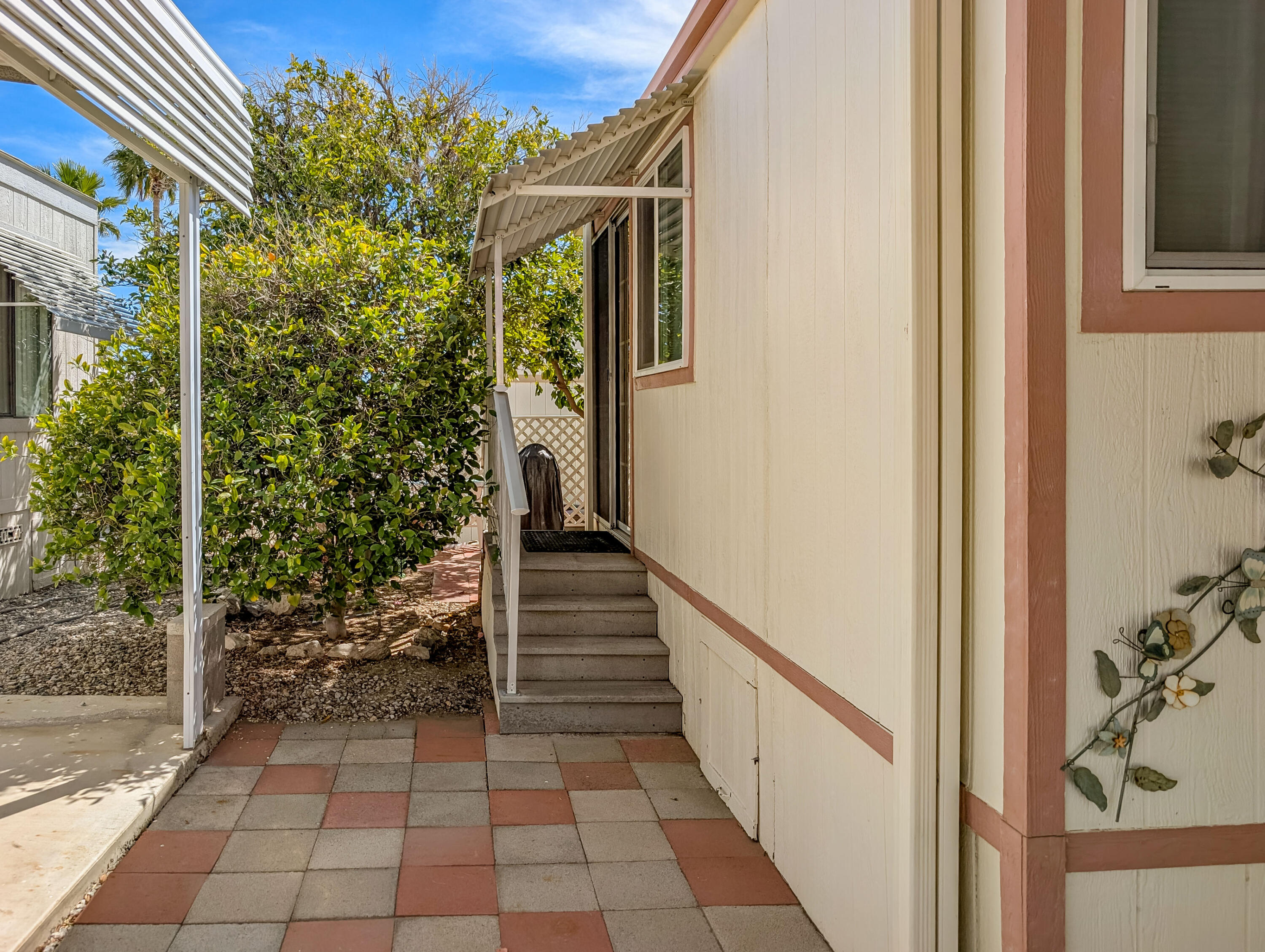 70200 Dillon Road, Unit 119 Desert Hot Springs, CA 92241 - Photo 7 of 31 Side View of Home