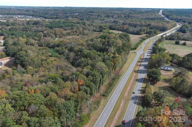 an aerial view of a city with lots of residential buildings