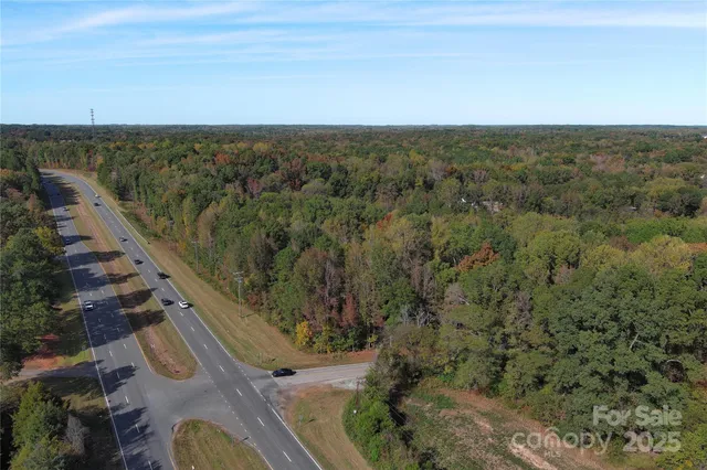 an aerial view of houses with outdoor space