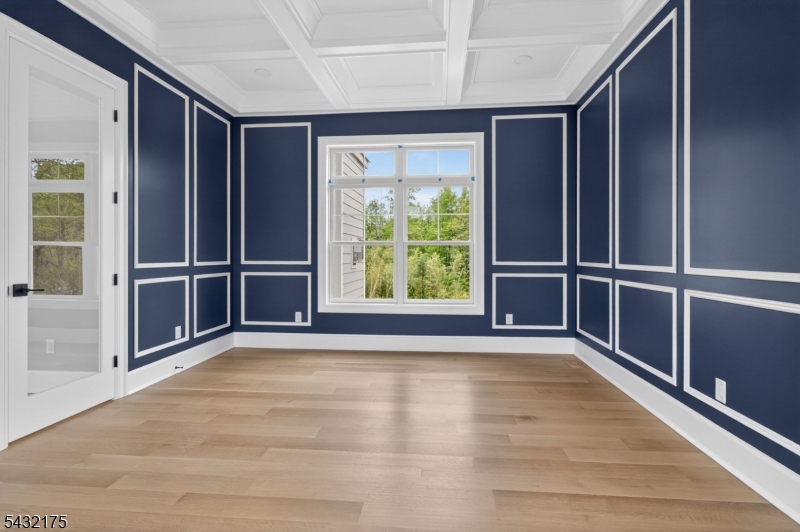 2 Ravinn Lane Warren, NJ 07059 - Photo 11 of 32 a view of an empty room with wooden floor and a window