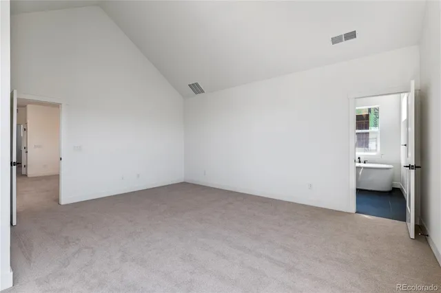 a bathroom with a sink a mirror and a bathtub