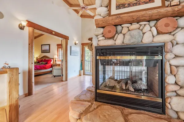 a living room with furniture and a rug