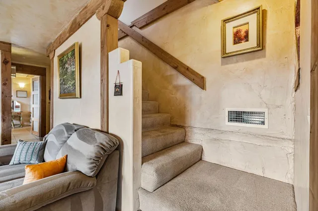 a kitchen with stainless steel appliances granite countertop a stove and a microwave