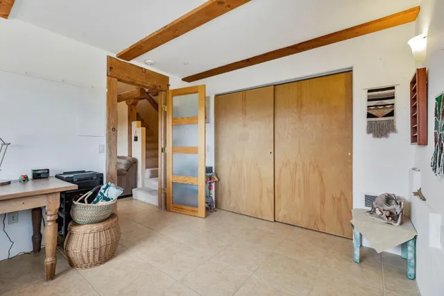 a view of balcony with furniture