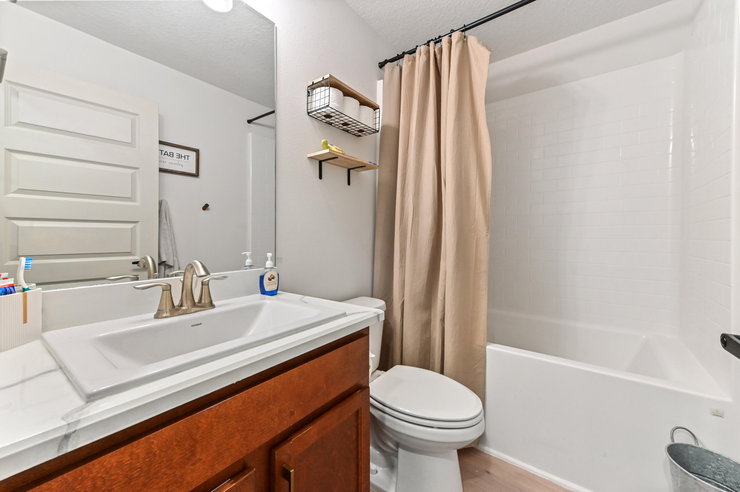 5352 Lugo Street Fort Pierce, FL 34951 - Photo 26 of 44 a bathroom with a sink toilet and shower