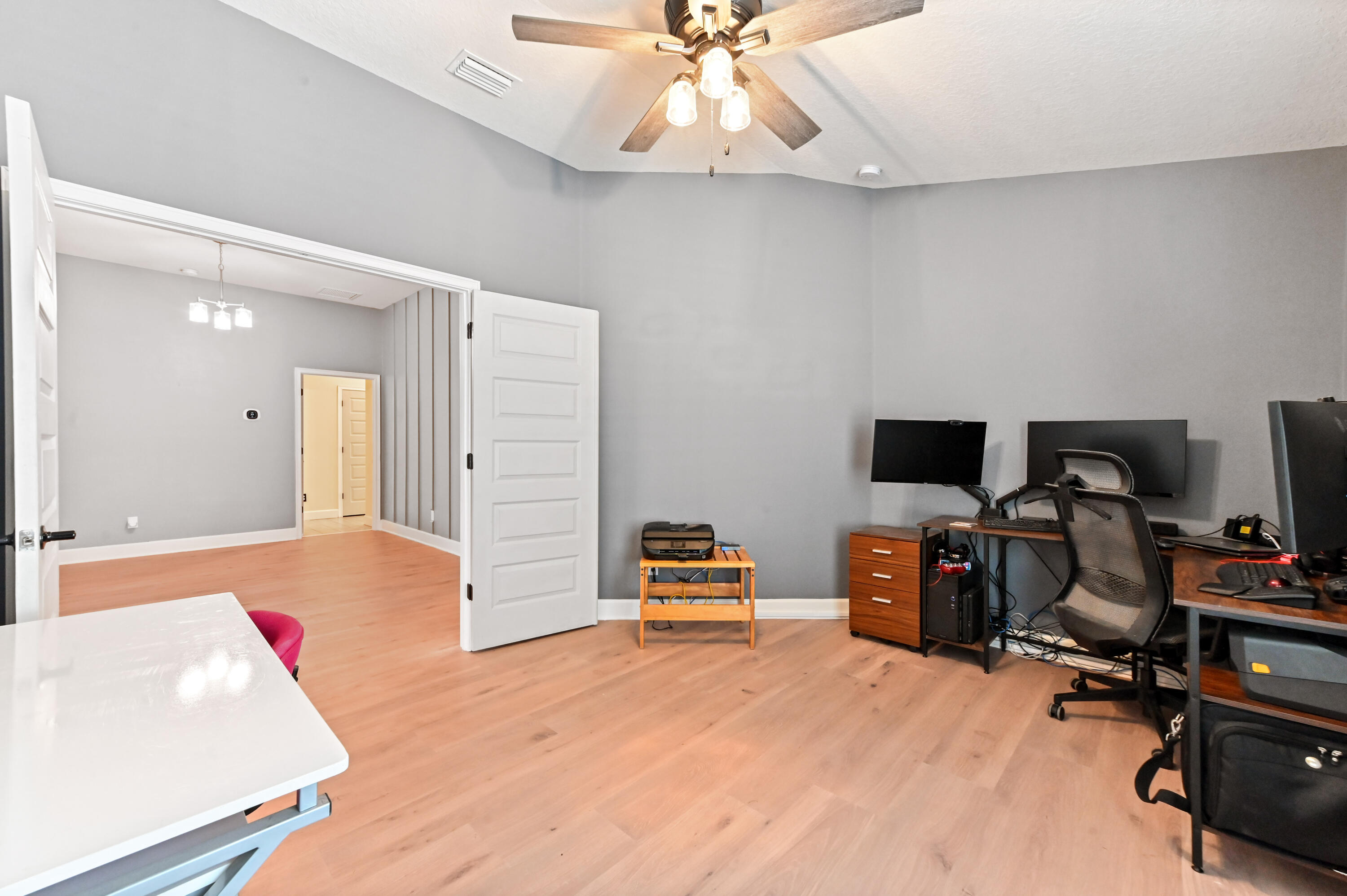 5352 Lugo Street Fort Pierce, FL 34951 - Photo 28 of 44 a bedroom with a workspace