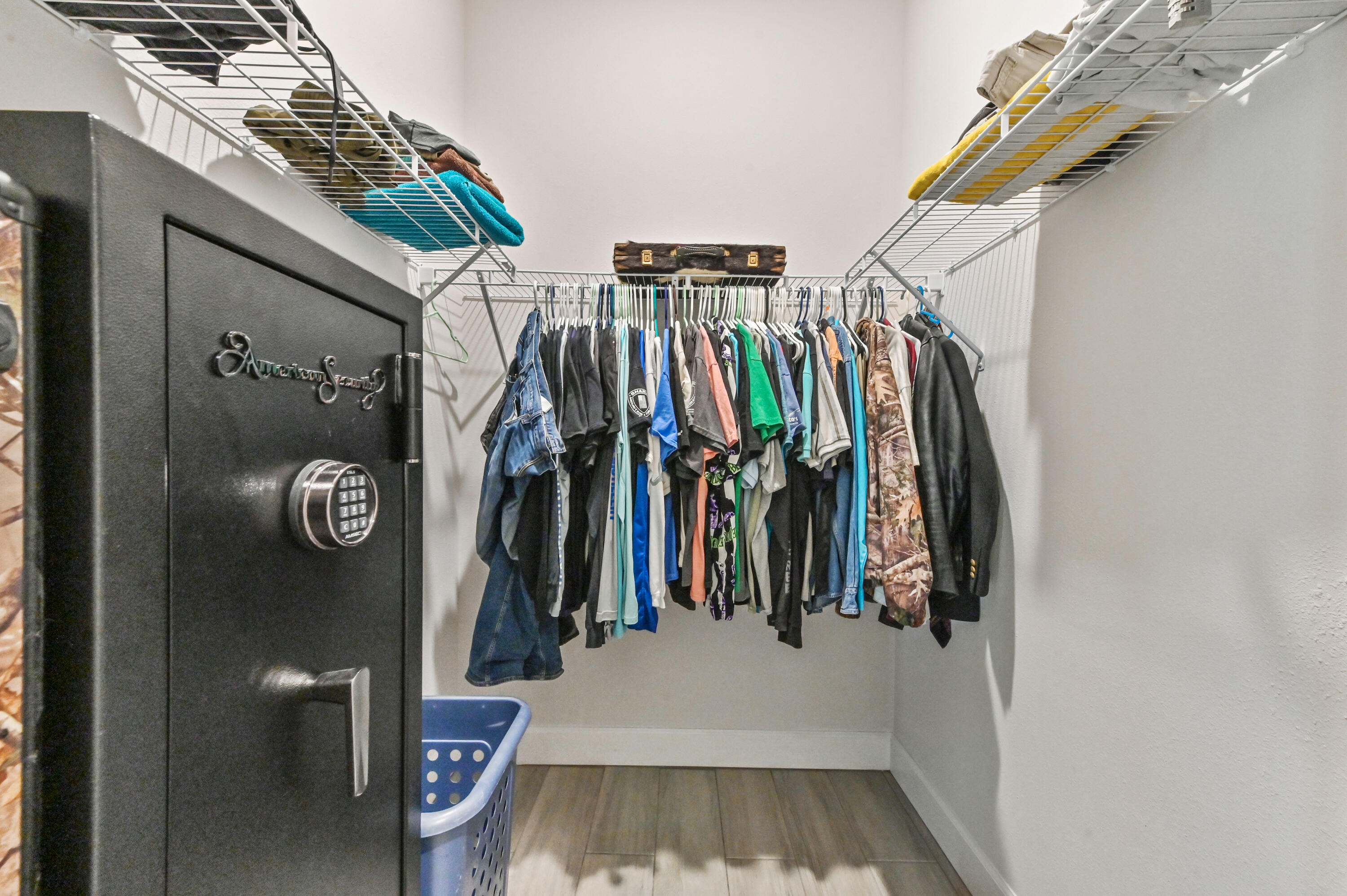 5352 Lugo Street Fort Pierce, FL 34951 - Photo 33 of 44 a view of walk in closet with clothes
