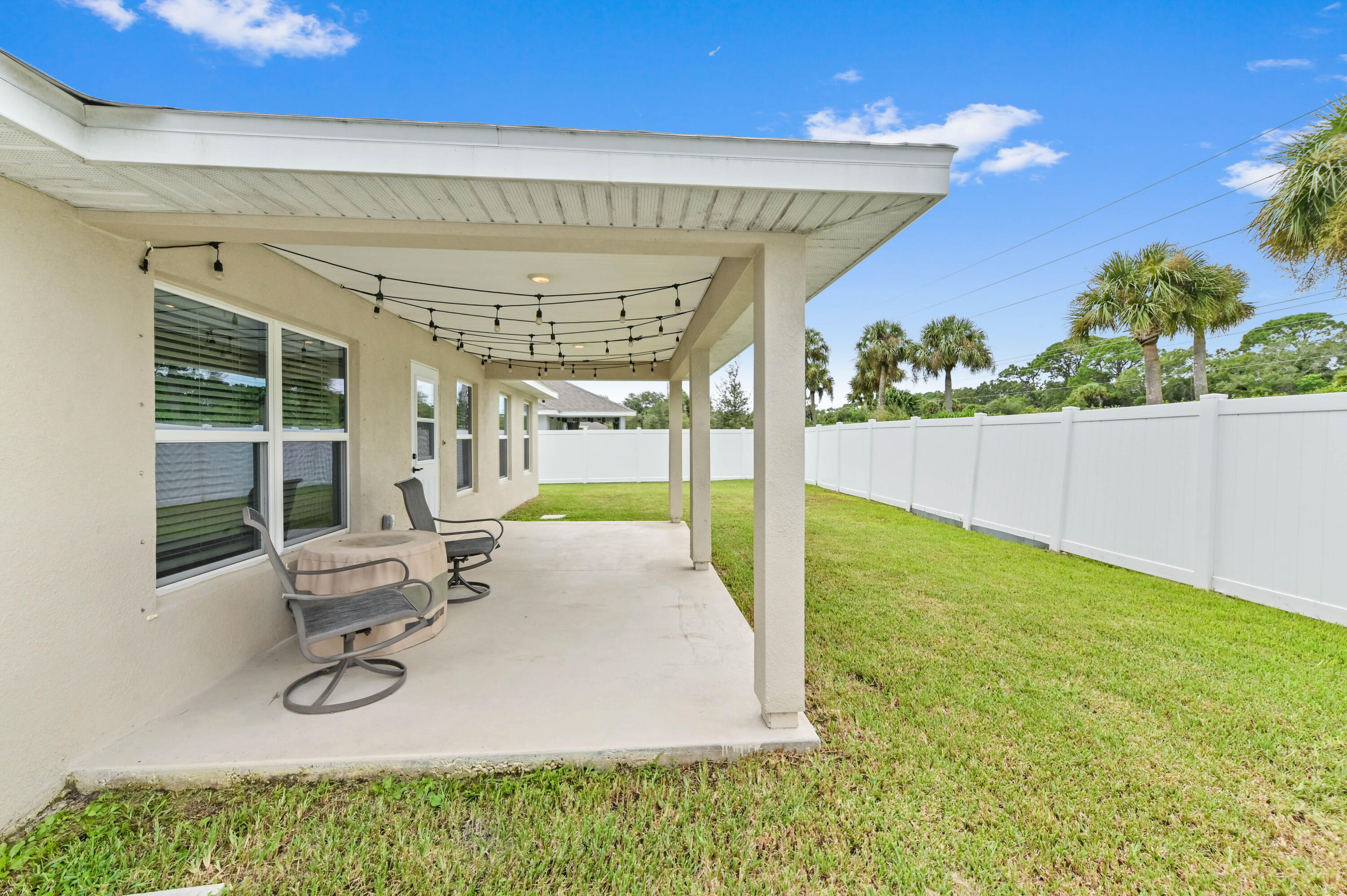 5352 Lugo Street Fort Pierce, FL 34951 - Photo 37 of 44 a view of an outdoor dining space with furniture
