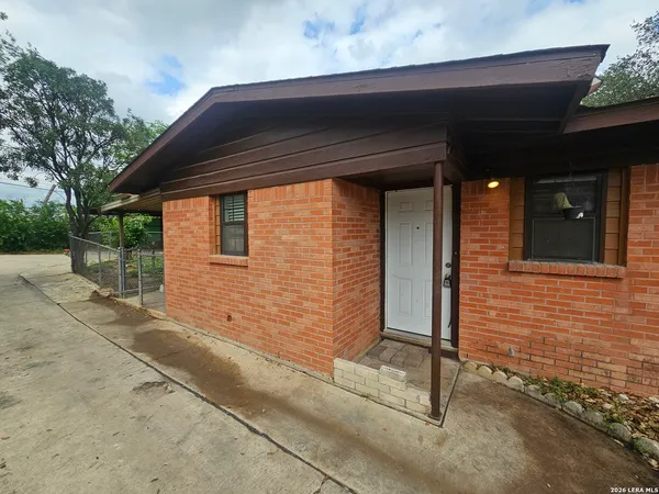 a front view of a house with a garage