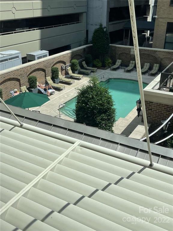 230 South Tryon Street, Unit 508 Charlotte, NC 28202 - Photo 22 of 24 a view of a backyard with plants and entertaining space