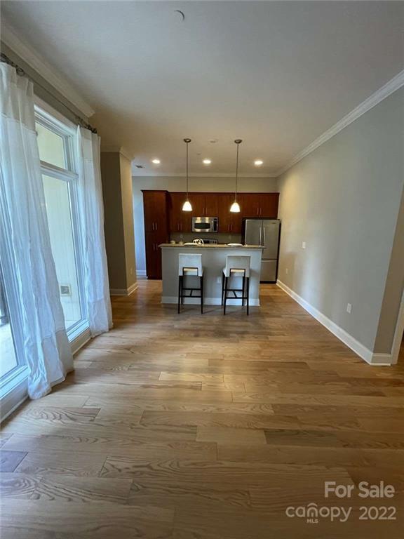 230 South Tryon Street, Unit 508 Charlotte, NC 28202 - Photo 3 of 24 a view of a lobby with furniture