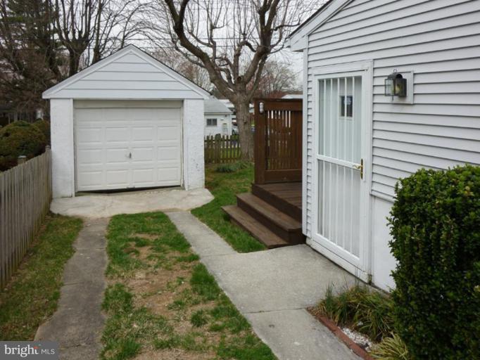 6216 Tramore Road Baltimore, MD 21214 - Photo 6 of 30 a front view of a house with garden