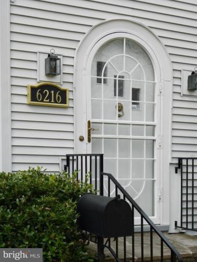 6216 Tramore Road Baltimore, MD 21214 - Photo 8 of 30 a front view of a house with a porch