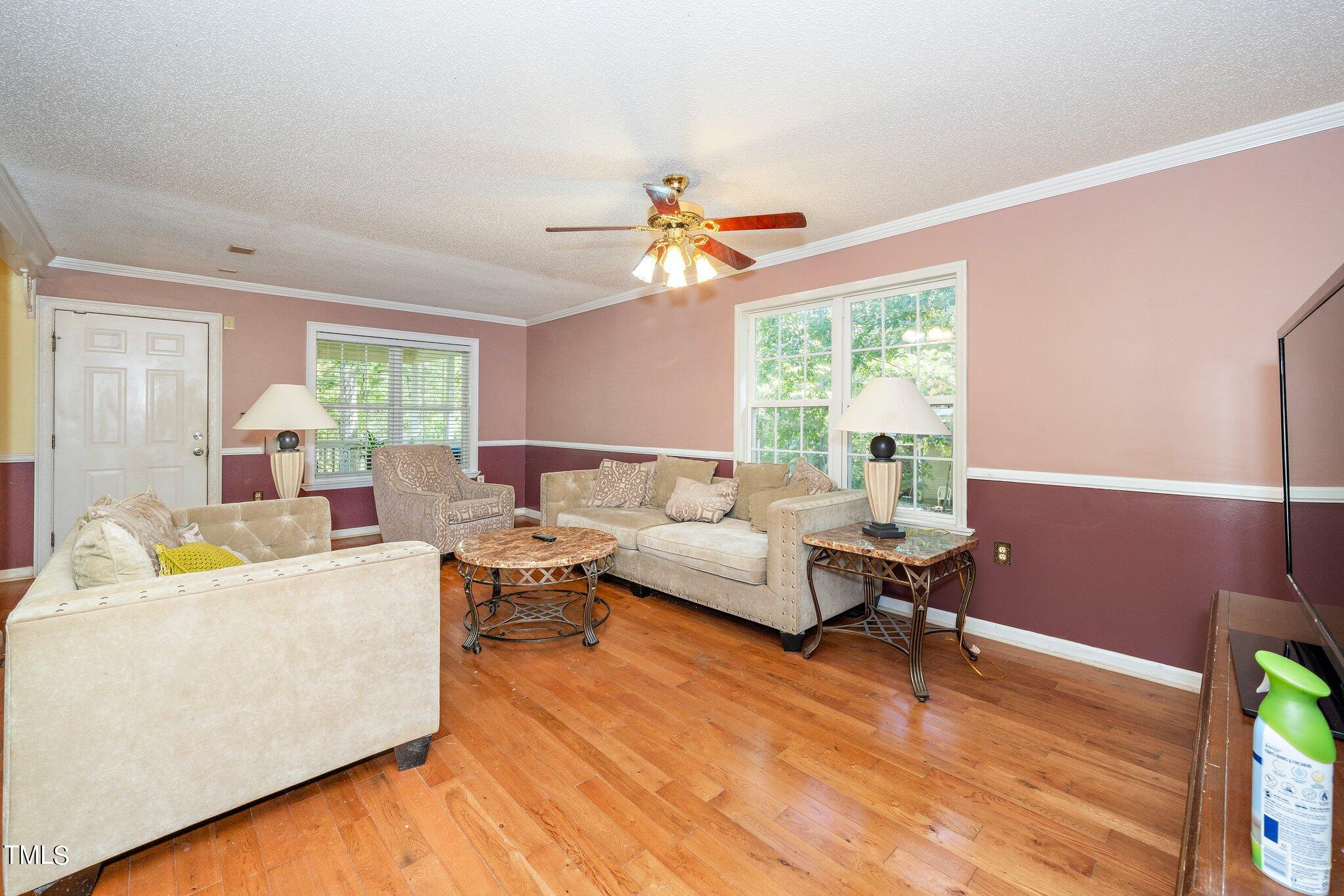 2514 Gemena Road Chapel Hill, NC 27516 - Photo 13 of 21 a living room with furniture and a large window