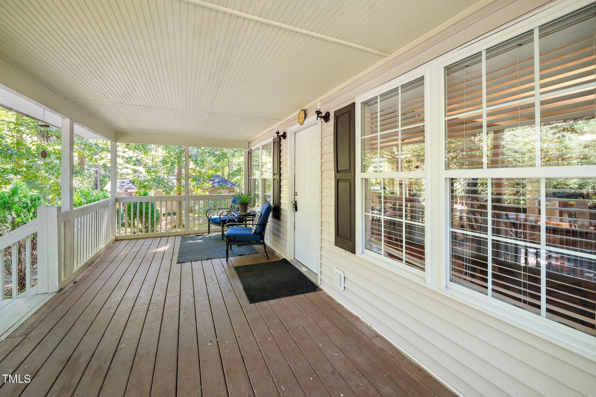 2514 Gemena Road Chapel Hill, NC 27516 - Photo 6 of 21 a view of balcony with wooden floor