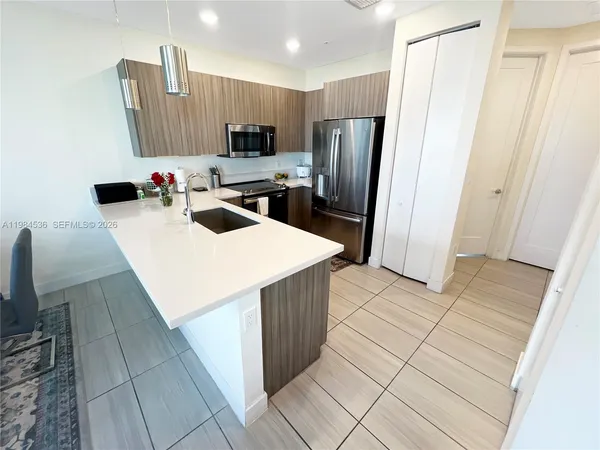 $430,000 | 6416 Northwest 102nd Court, Unit 304, Doral, FL 33178