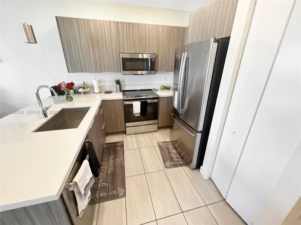 $430,000 | 6416 Northwest 102nd Court, Unit 304, Doral, FL 33178