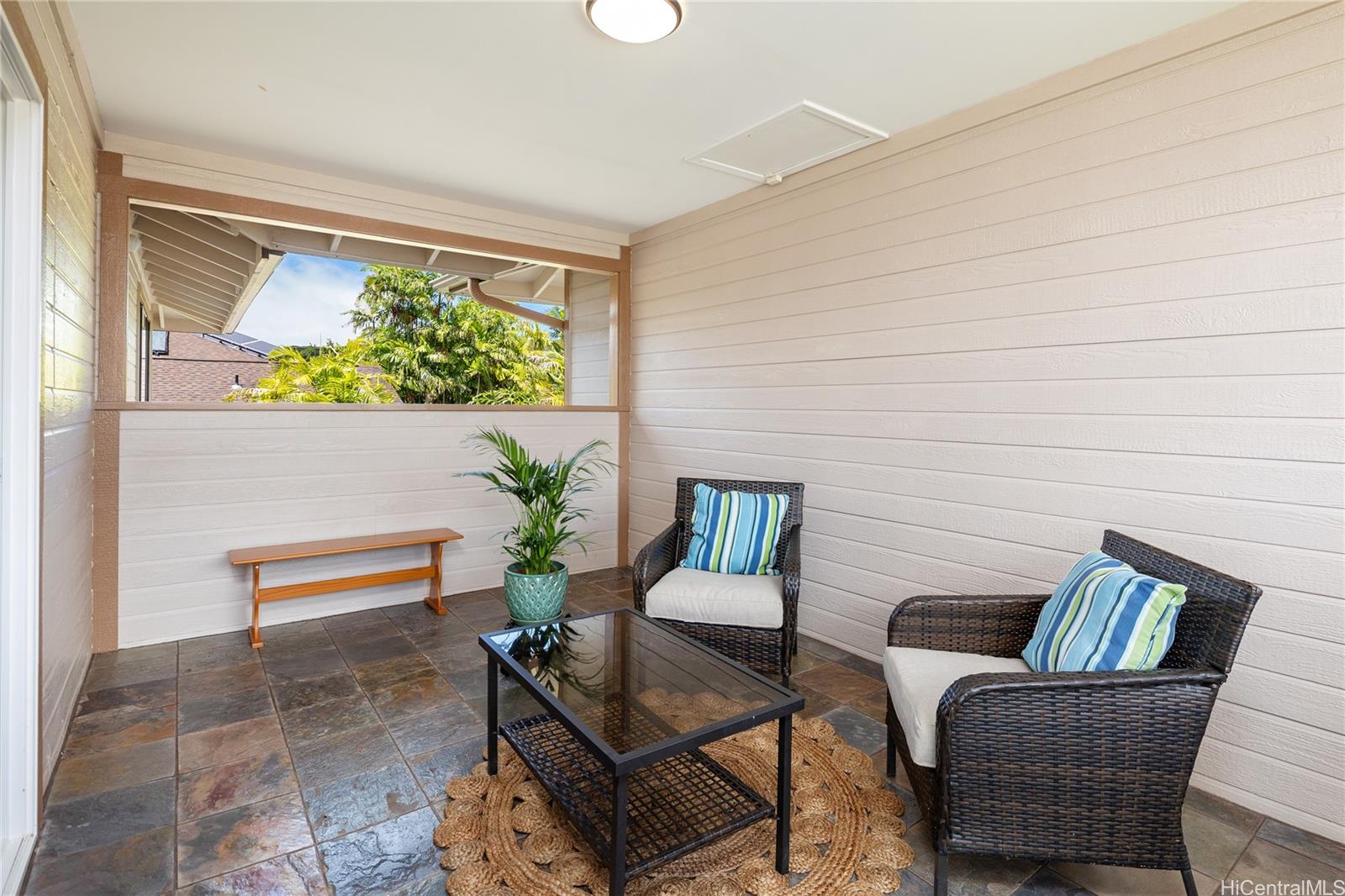 95-210 Kuauna Place Mililani, HI 96789 - Photo 13 of 25 a view of a livingroom with furniture and a potted plant
