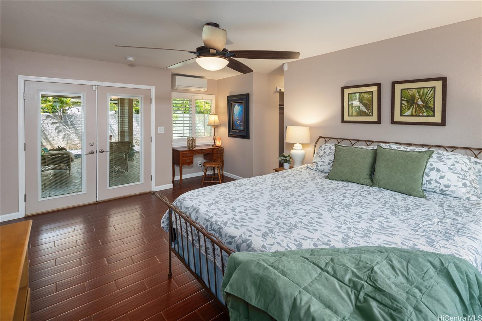 95-210 Kuauna Place Mililani, HI 96789 - Photo 15 of 25 a bedroom with a large bed and a window