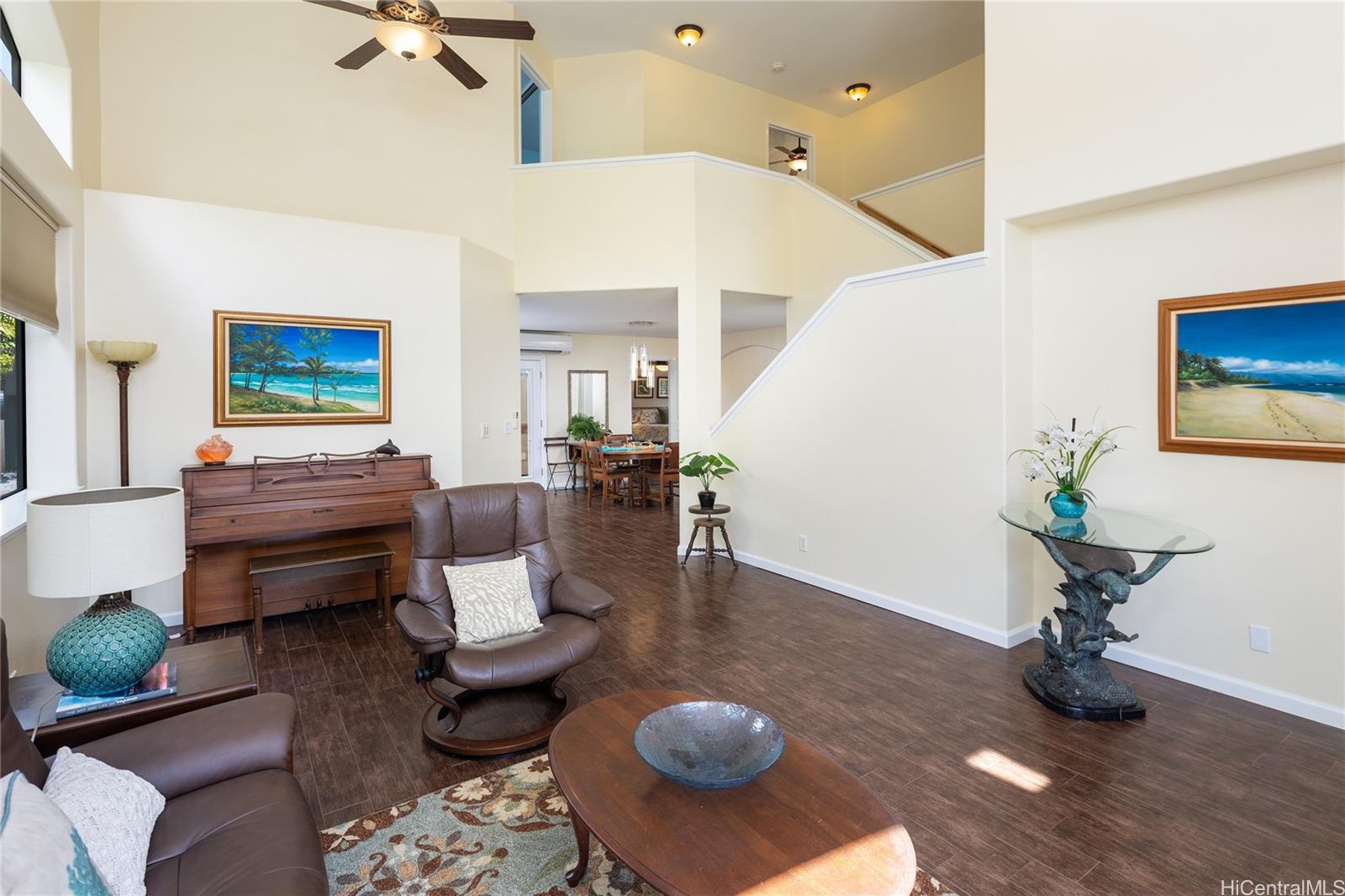 95-210 Kuauna Place Mililani, HI 96789 - Photo 3 of 25 a living room with furniture and a potted plant