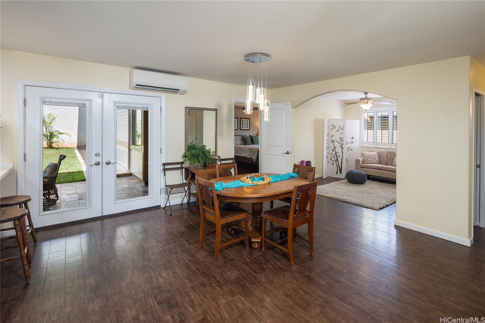 95-210 Kuauna Place Mililani, HI 96789 - Photo 4 of 25 a dining room with furniture and wooden floor