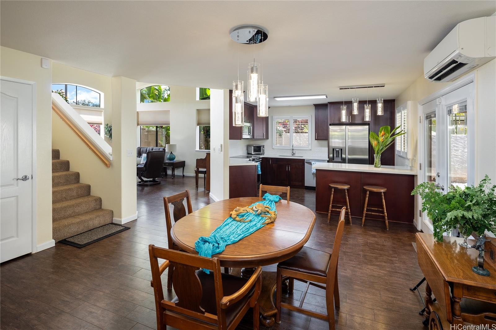 95-210 Kuauna Place Mililani, HI 96789 - Photo 5 of 25 a view of a dining room with furniture window and wooden floor