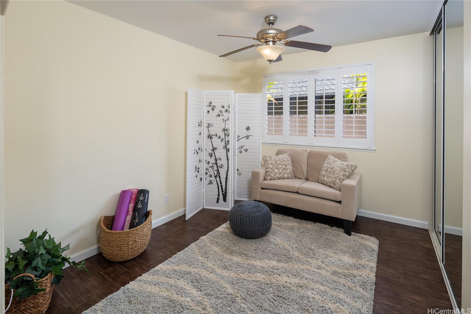 95-210 Kuauna Place Mililani, HI 96789 - Photo 6 of 25 a living room with furniture and a potted plant