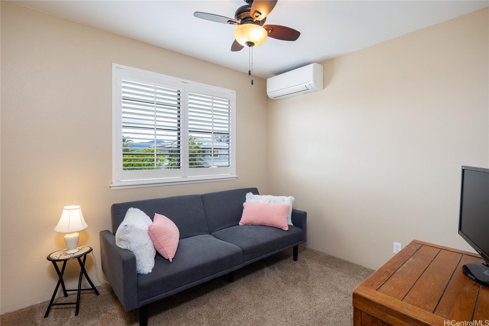 95-210 Kuauna Place Mililani, HI 96789 - Photo 8 of 25 a living room with furniture and a window