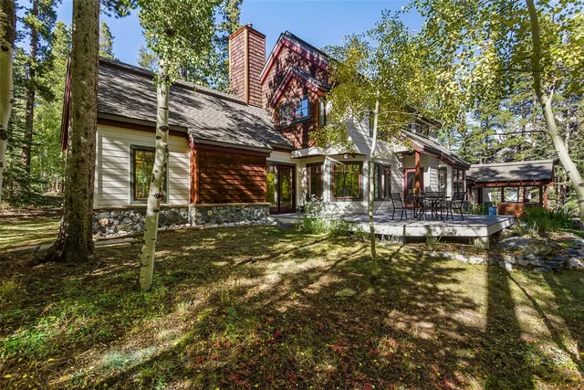 a view of a house with brick walls