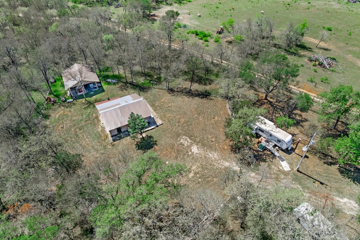 445 St Johns Road Dale, TX 78616 - Photo 15 of 17 an aerial view of a house with a yard and trees