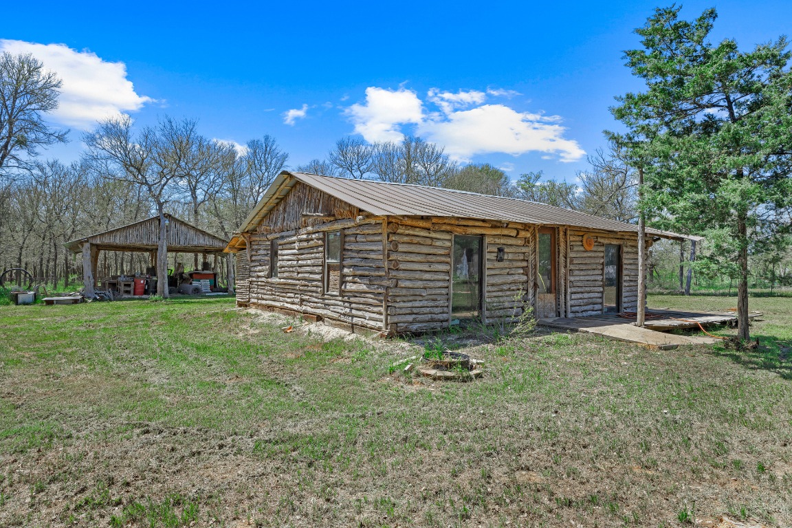 445 St Johns Road Dale, TX 78616 - Photo 4 of 17 a view of a house with yard and tree s