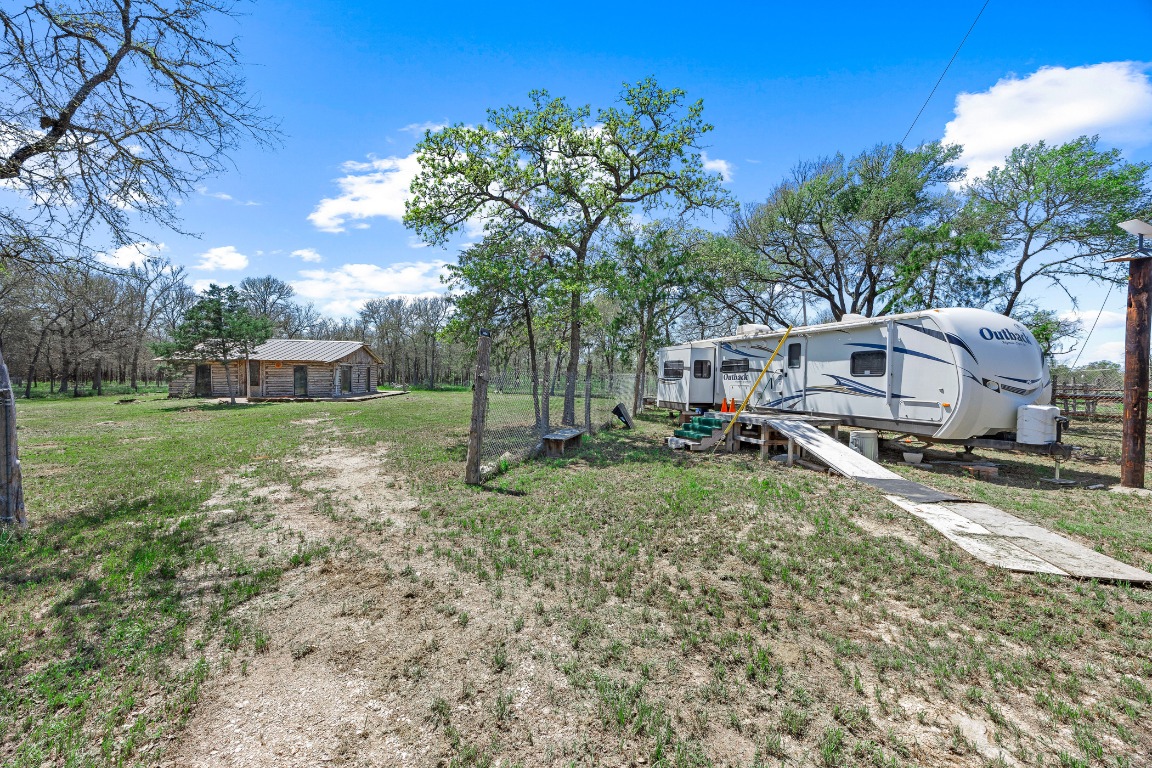 445 St Johns Road Dale, TX 78616 - Photo 5 of 17 a view of a house with backyard