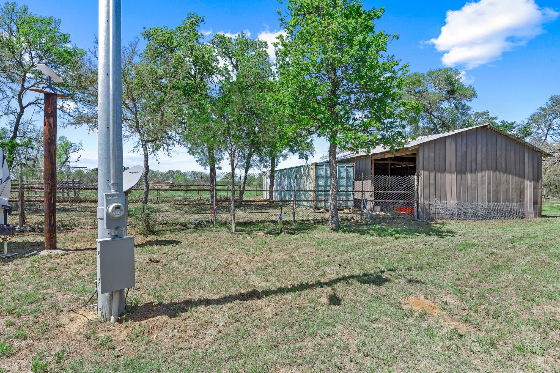 445 St Johns Road Dale, TX 78616 - Photo 7 of 17 a backyard of a house with lots of green space