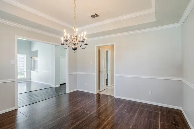 a view of a livingroom with wooden floor