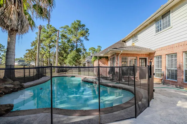 a view of outdoor space and swimming pool
