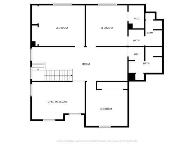 a black white and white photo of a beach