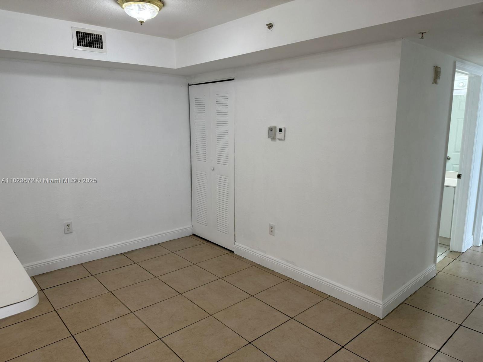 15422 Southwest 284th Street, Unit 7207 Homestead, FL 33033 - Photo 12 of 36 a view of an empty room