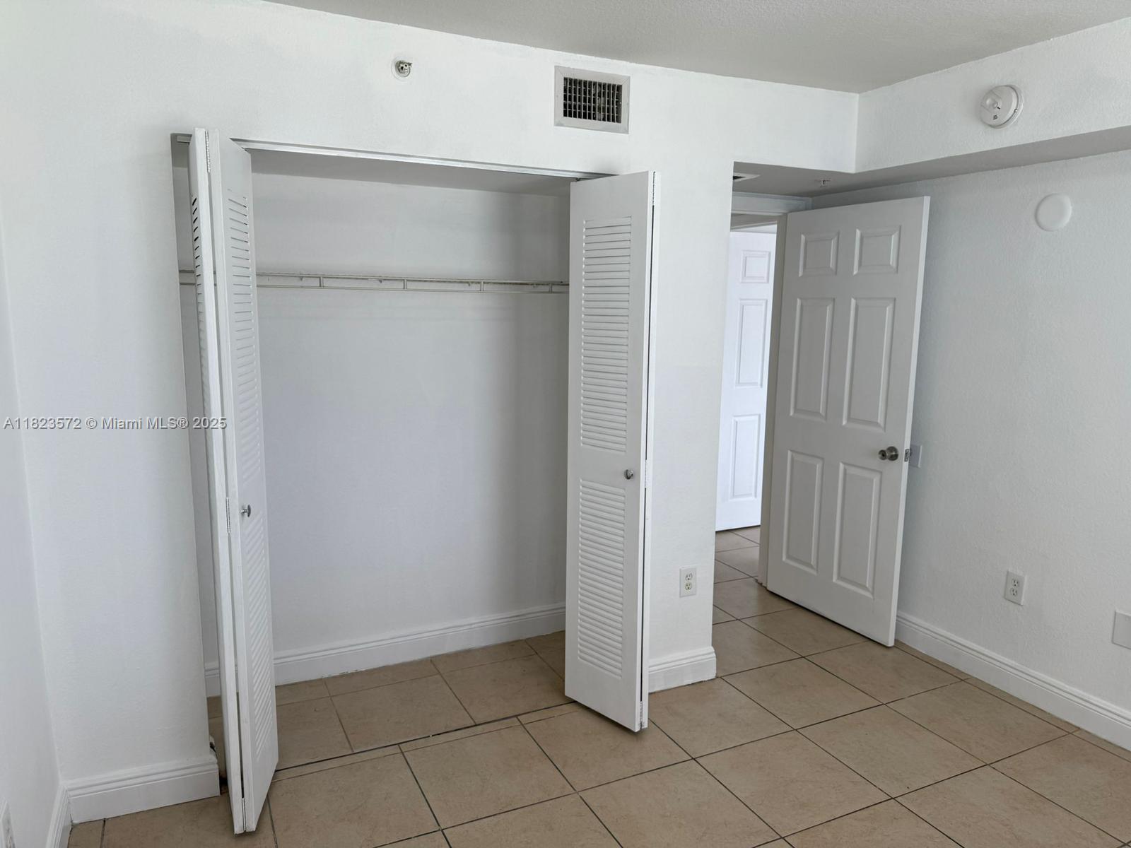 15422 Southwest 284th Street, Unit 7207 Homestead, FL 33033 - Photo 18 of 36 a view of an empty room