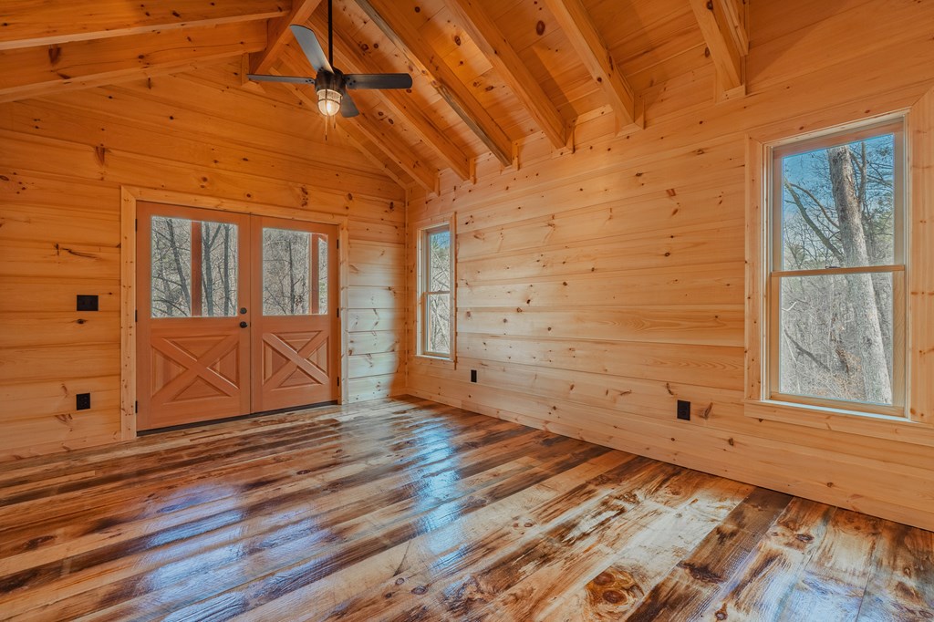 138 Rhondas Way Ellijay, GA 30540 - Photo 13 of 26 a view of a room with wooden floor and windows