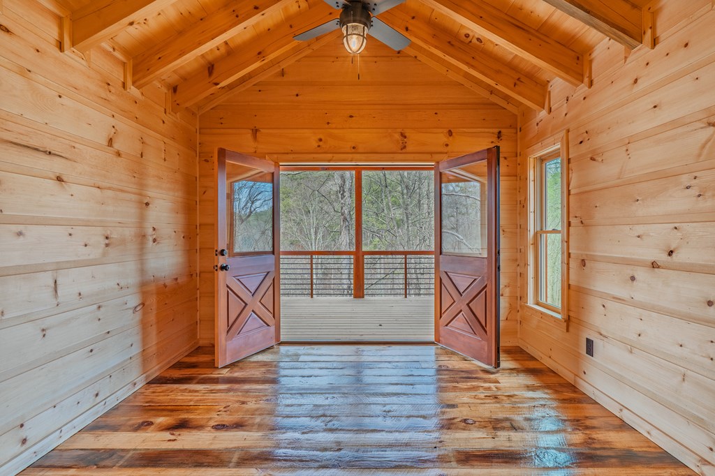 138 Rhondas Way Ellijay, GA 30540 - Photo 14 of 26 a view of a room with wooden floor and windows