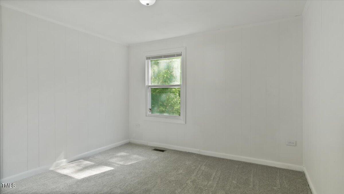2530 Spring Valley Road Henderson, NC 27537 - Photo 24 of 45 an empty room with a window