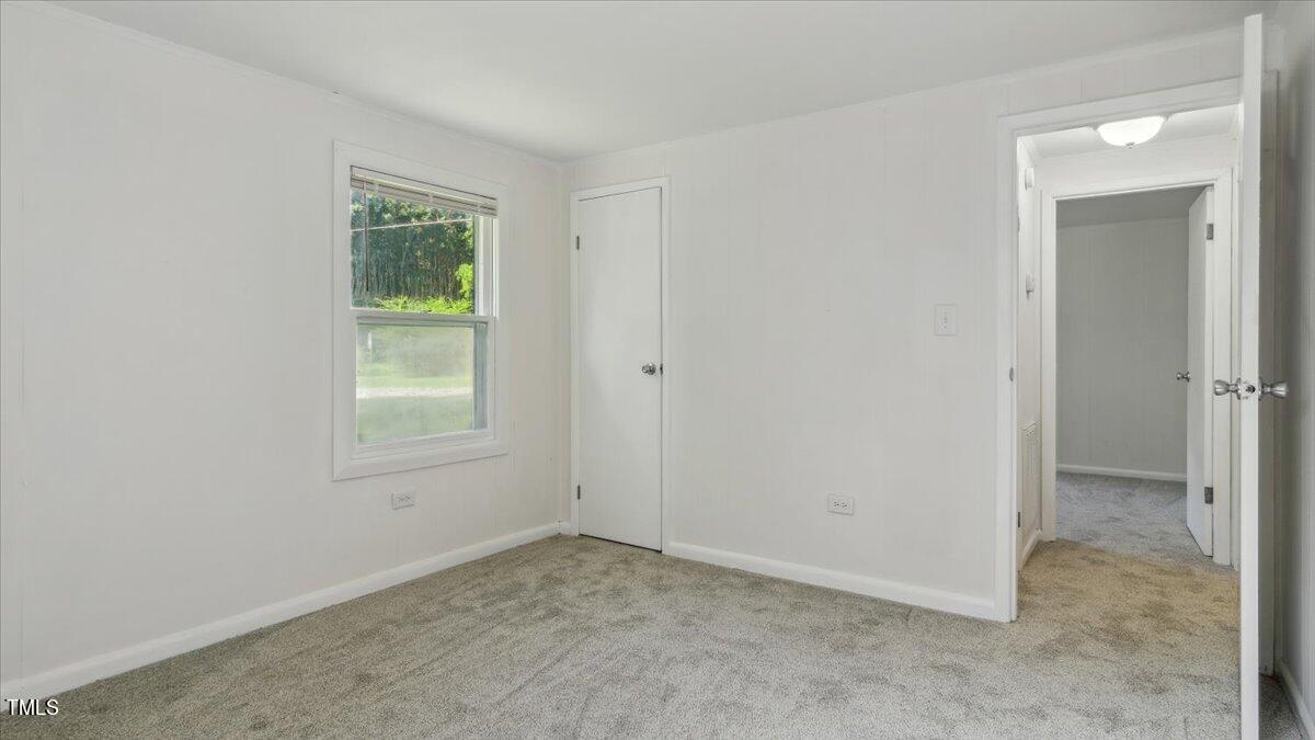 2530 Spring Valley Road Henderson, NC 27537 - Photo 26 of 45 an empty room with a window